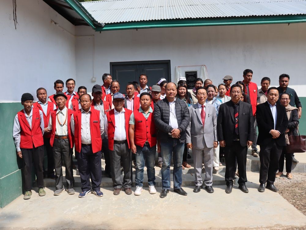 Dr Sukhato A Sema with others during the Primary Health Centre building (Day Care) at Lazami Village under Pughoboto block.